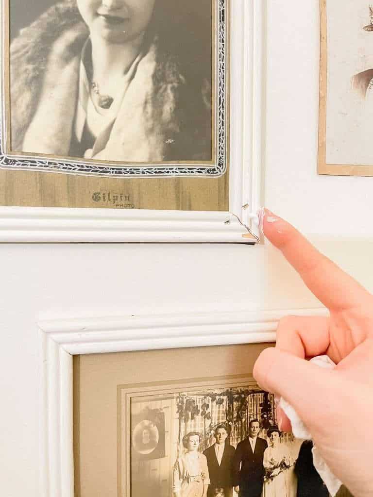 Caulking seams on an antique photo frame.