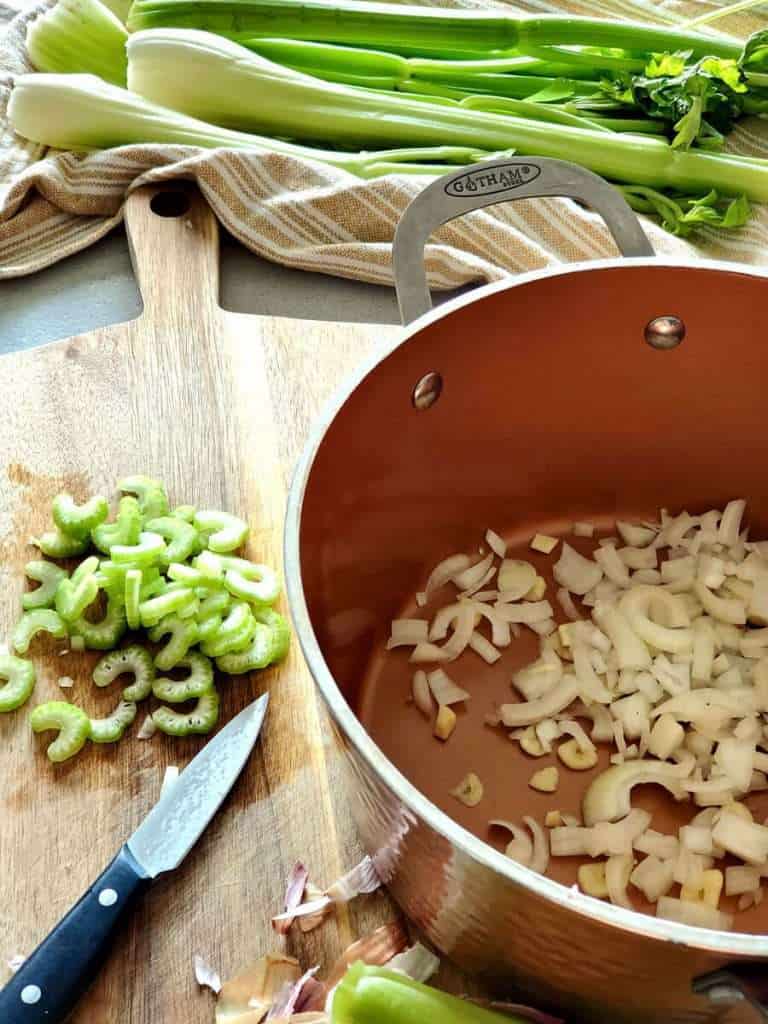 Celery and onion being cooked.