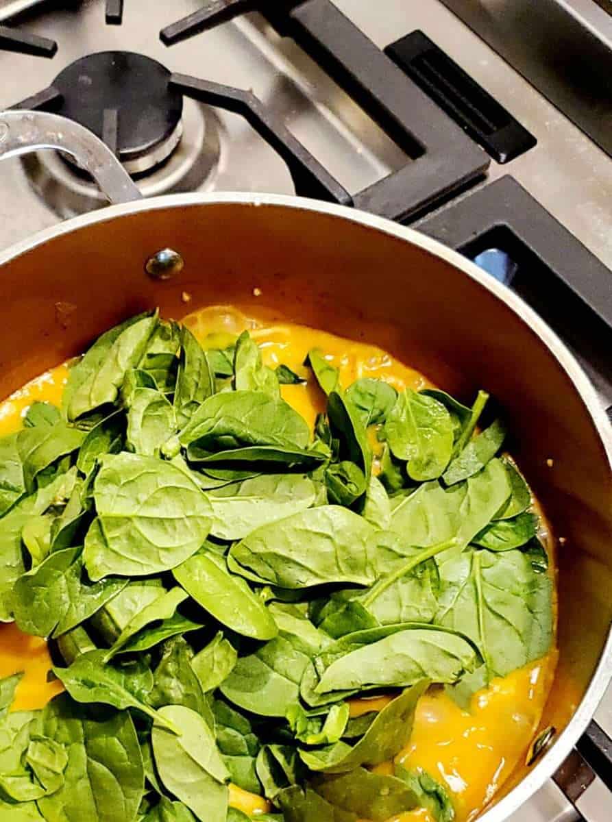 Add spinach to soup.