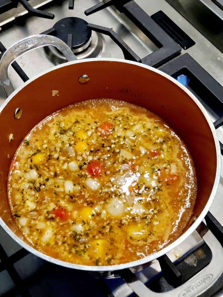 Soup cooking on a stove.