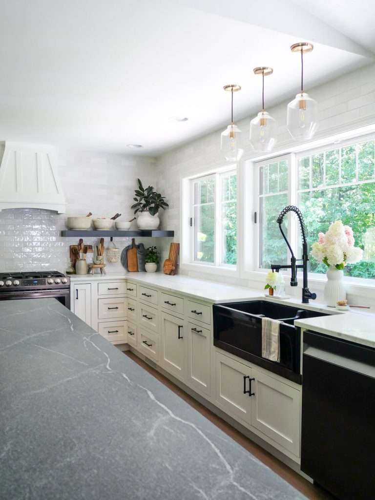 Quartz and granite countertops in a kitchen.
