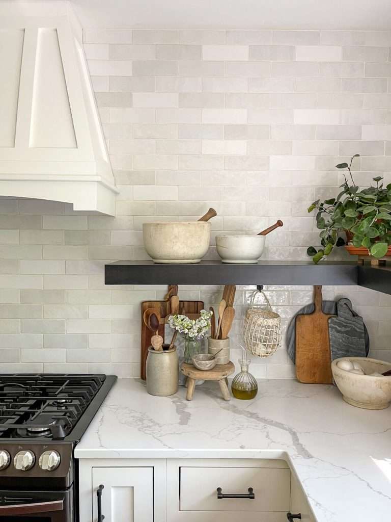Quartz countertop with a kitchen shelf.