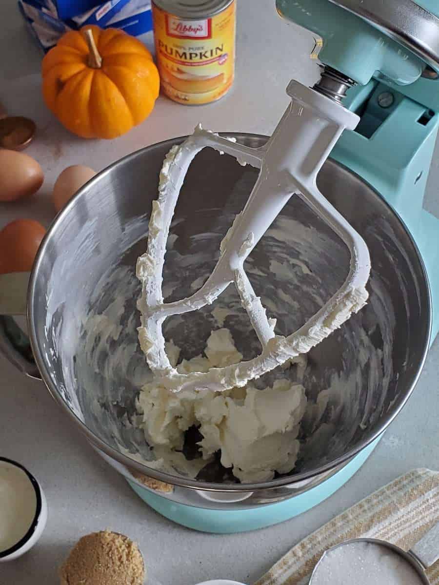 Mixing cream cheese.