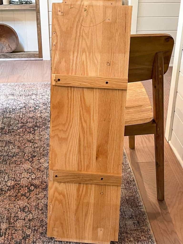 Table leaf being cut down to a shelf.