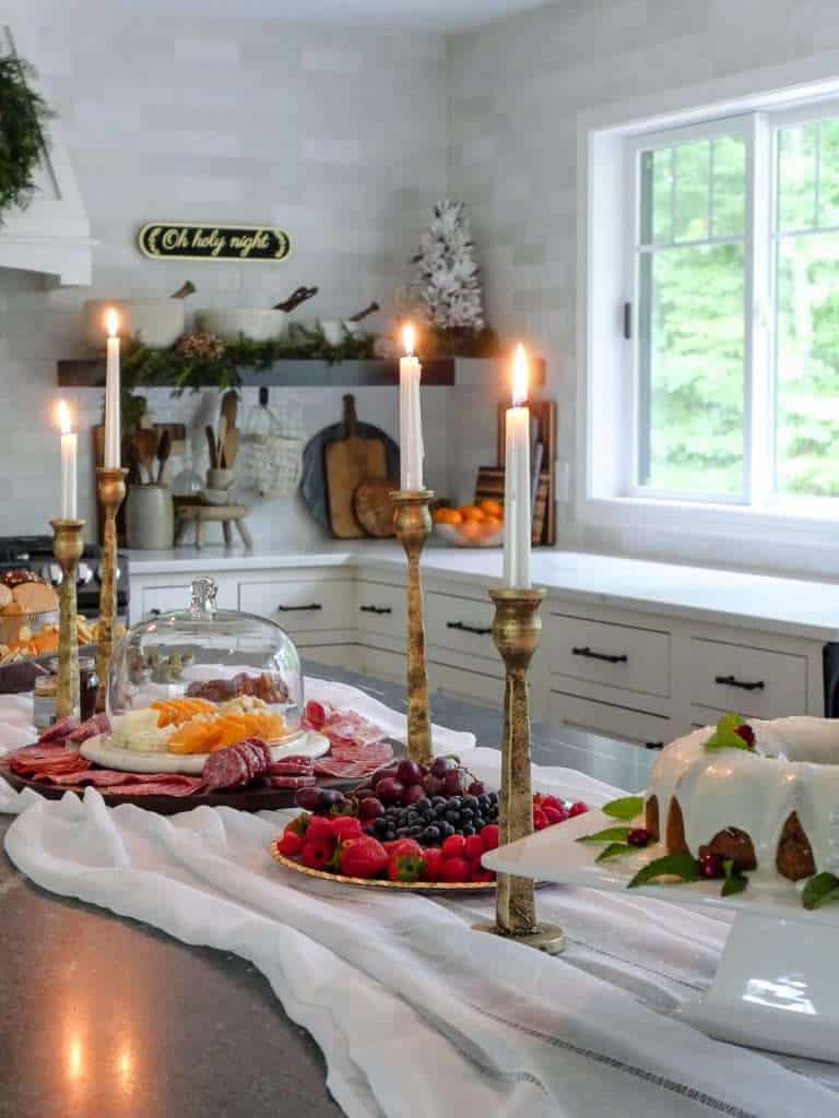 Holiday hosting decor and food on a kitchen island.