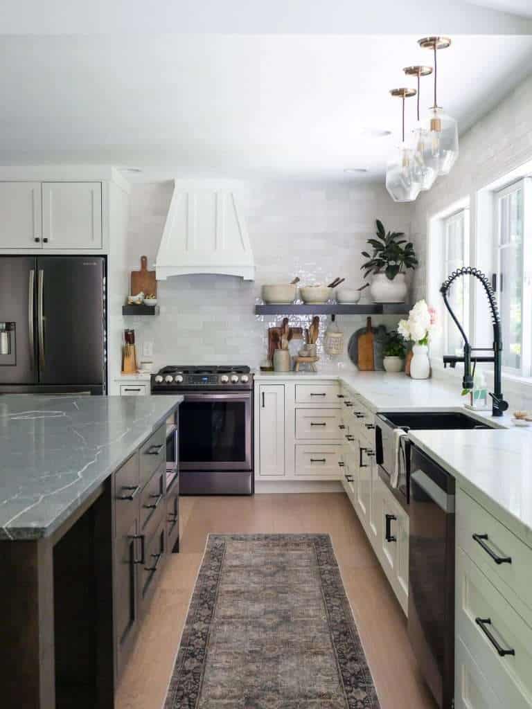 Kitchen with runner and range hood.