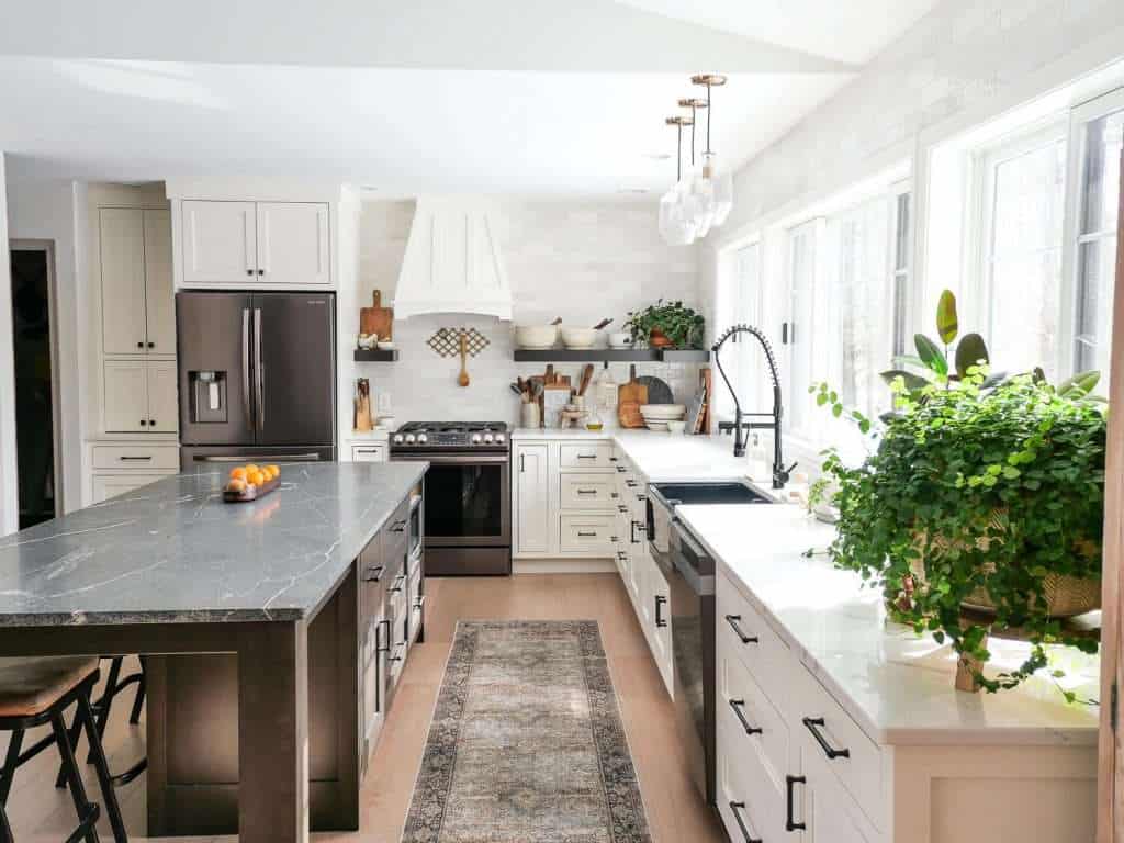 Kitchen with granite and quartz countertops.