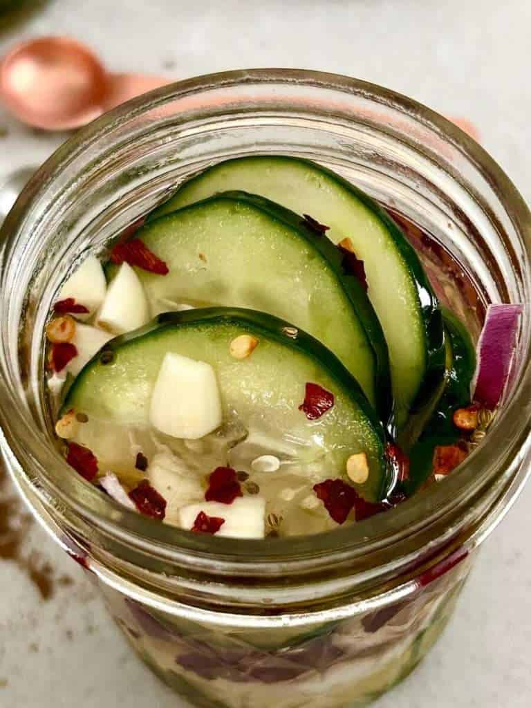 Pickled Cucumbers and Red Onions in a jar
