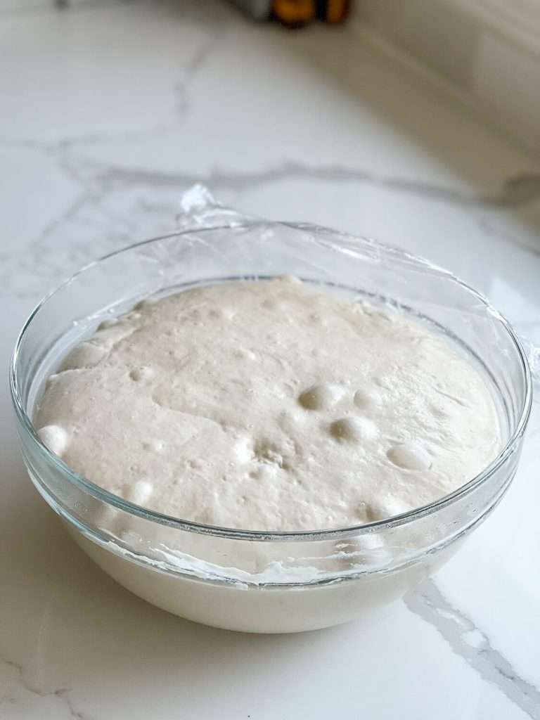 Sourdough dough risen in a bowl