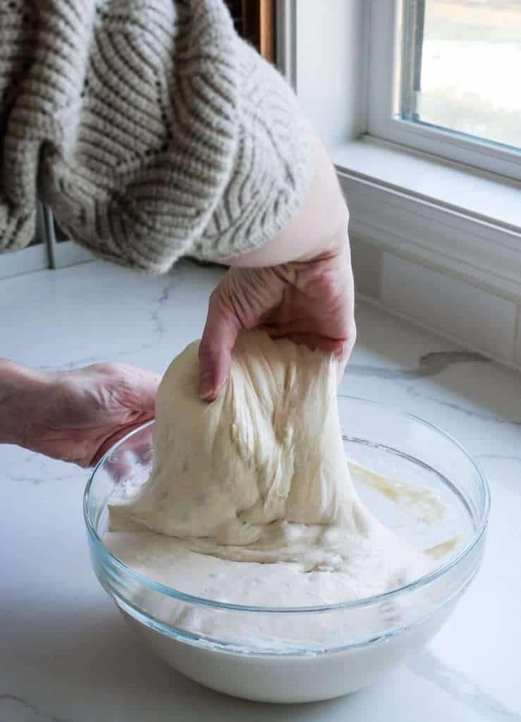 Stretch and fold for sourdough bread.