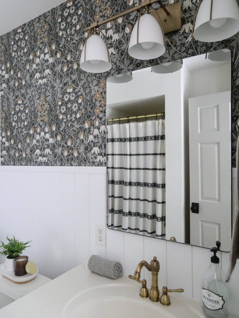 Bathroom mirror with white shiplap