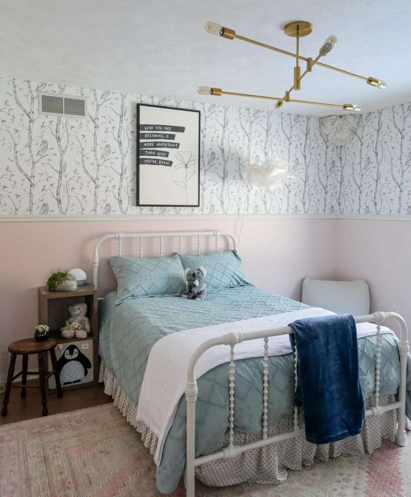 Girl's bedroom with simple bed styling.