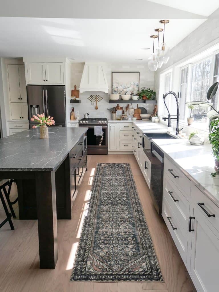 Transitional kitchen with stone countertops.
