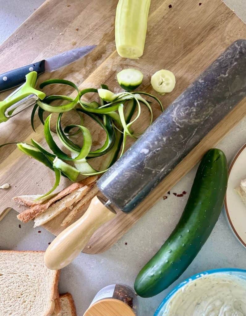 Cucumber being sliced