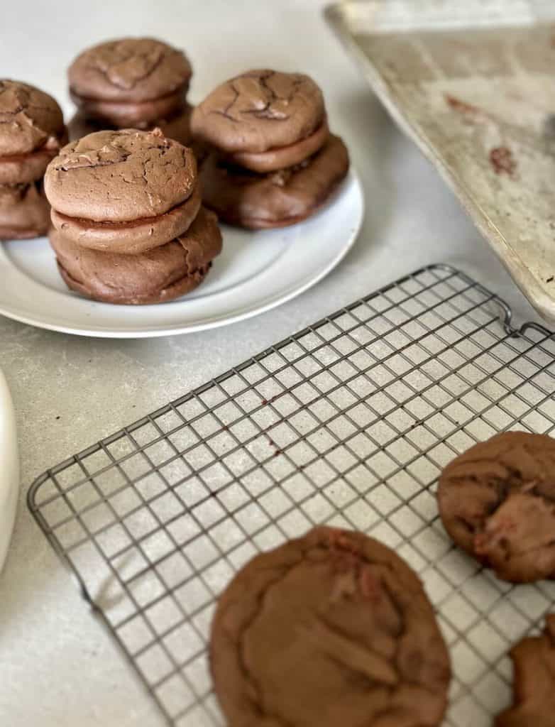 Stacked whoopie pies cooling.