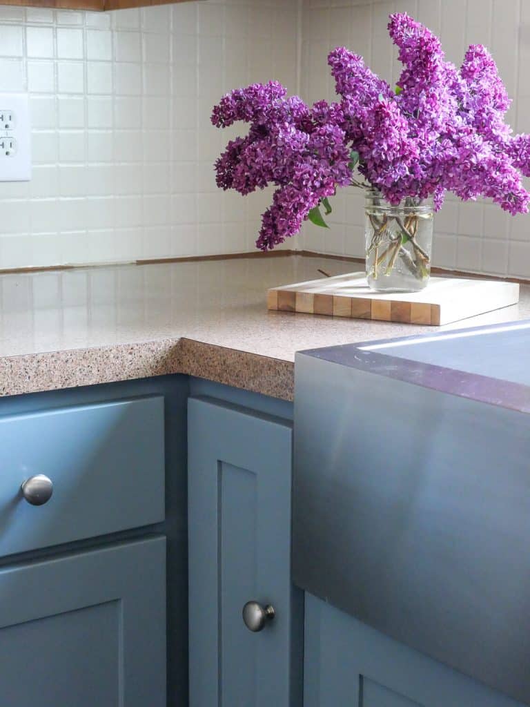 Lilacs in a kitchen