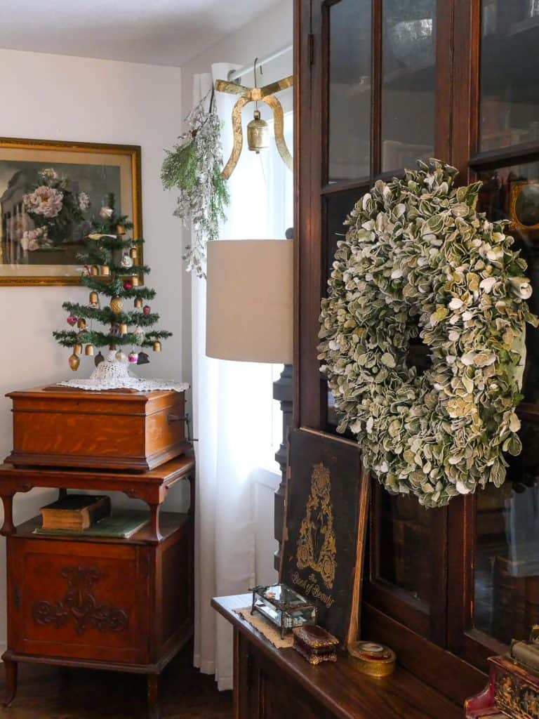 Wreath on an antique cabinet.