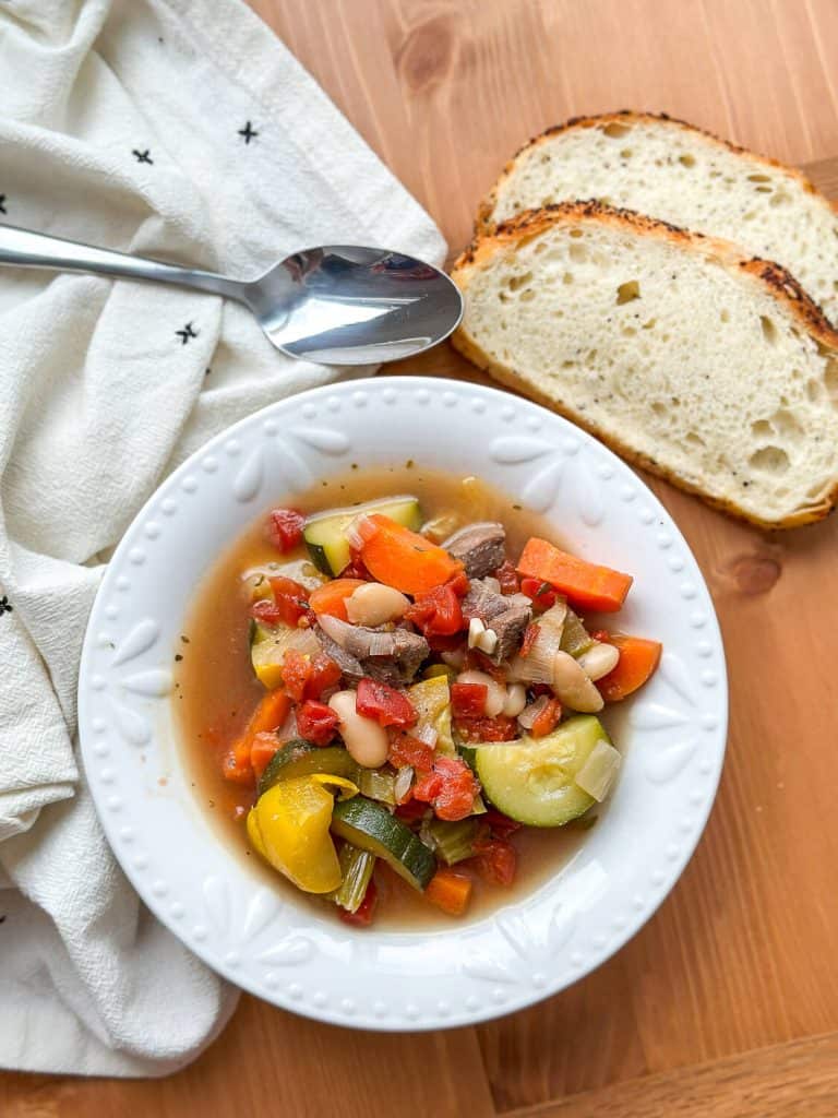 Venison vegetable soup with bread.