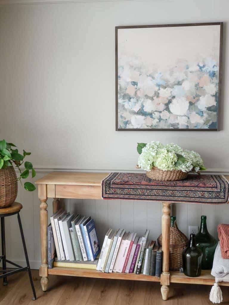 Faux hydrangeas in a console table.