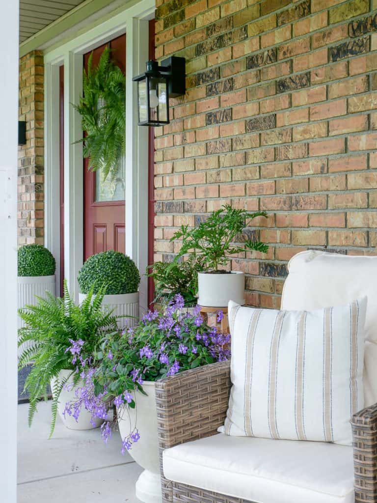Faux Plants for Front Porch with patio furniture.
