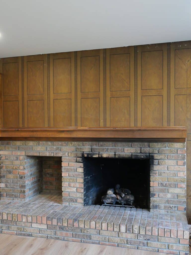 Brick fireplace before makeover.