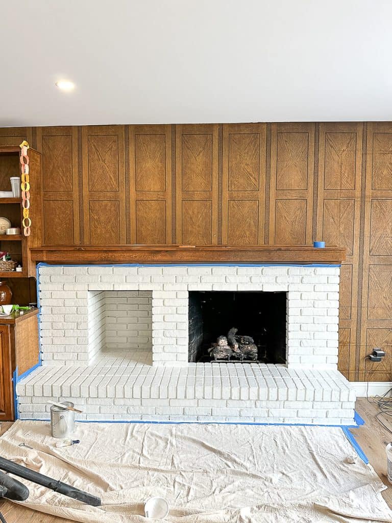 Painted brick fireplace.