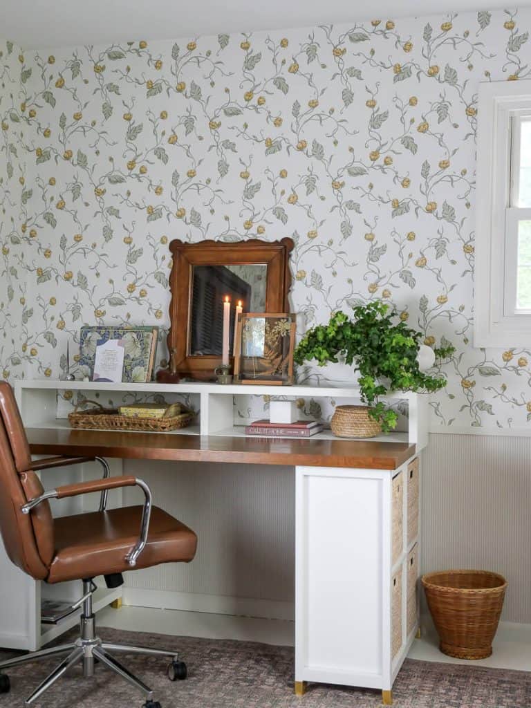 Home office styled with cottage core decor.