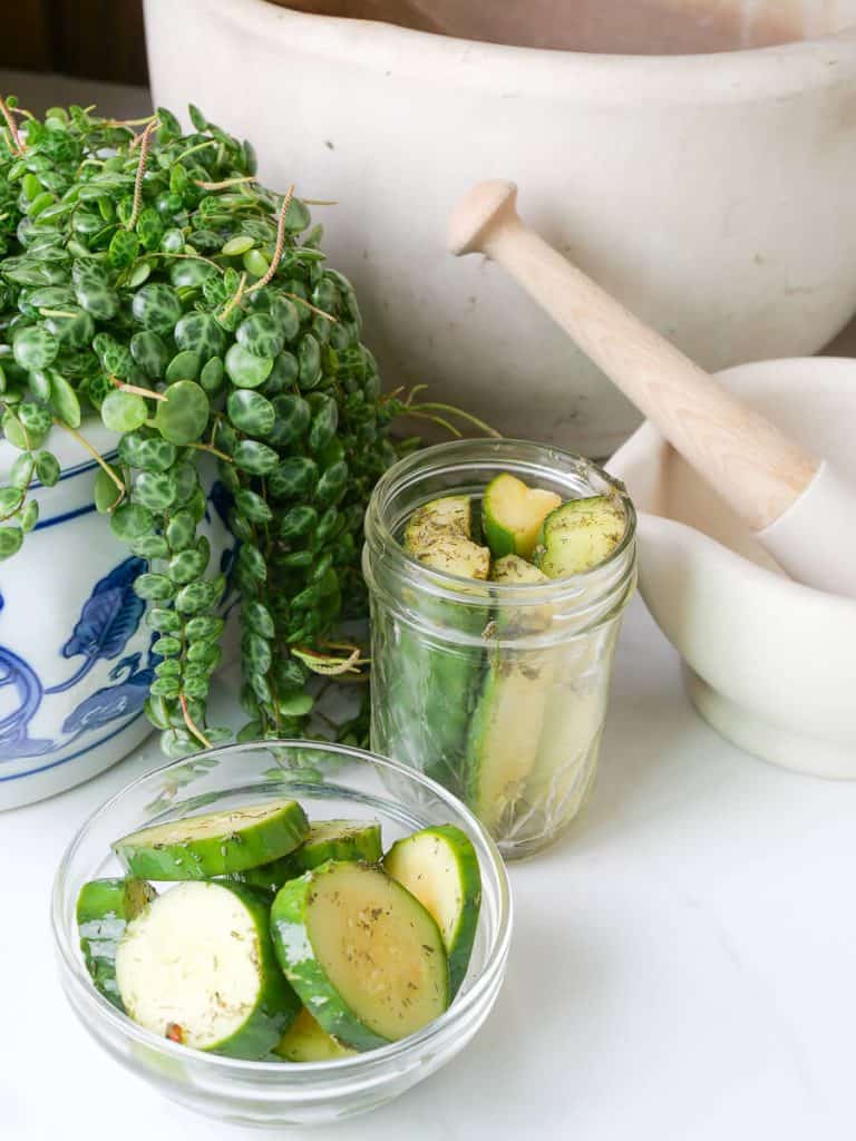 Homemade refrigerator dill pickles in jars.