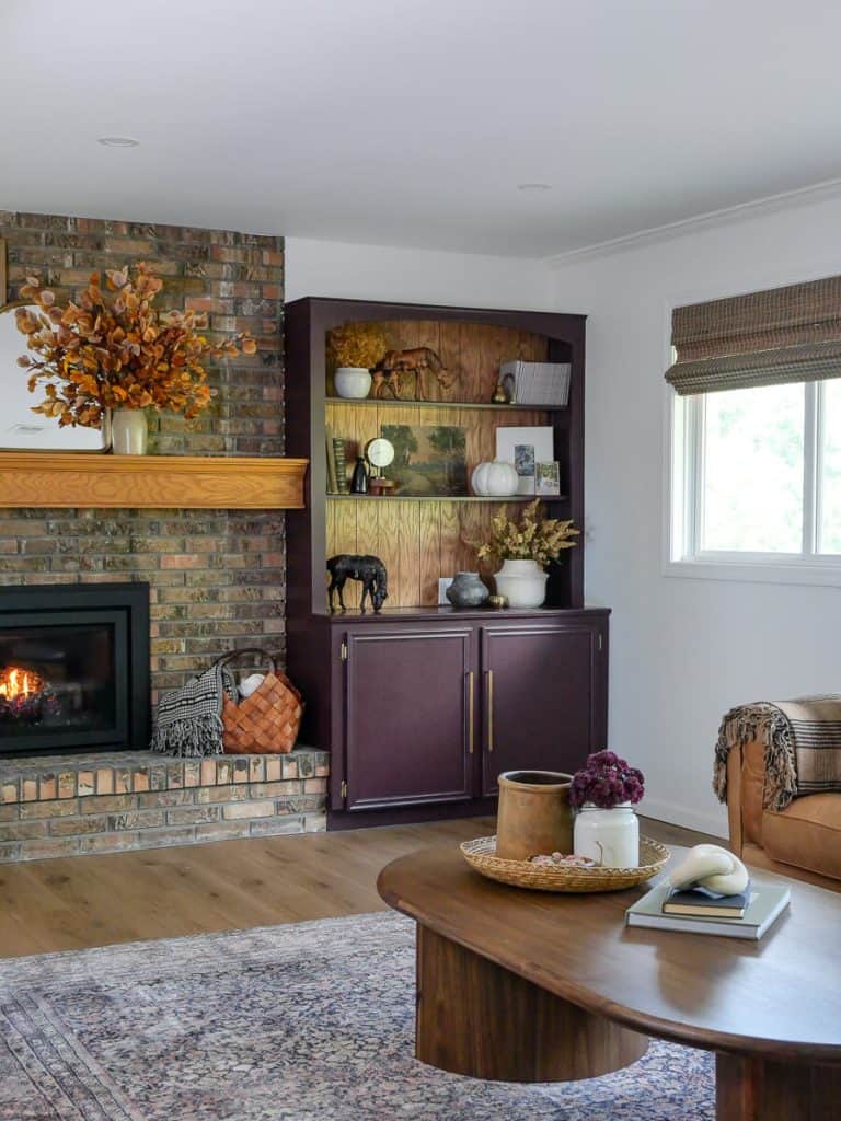 Living room coffee table decorated for fall.