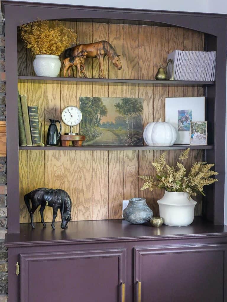 Decorating ideas for a fall living room display cabinet.