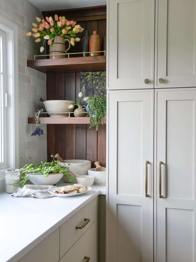 Spring decor on kitchen shelves.