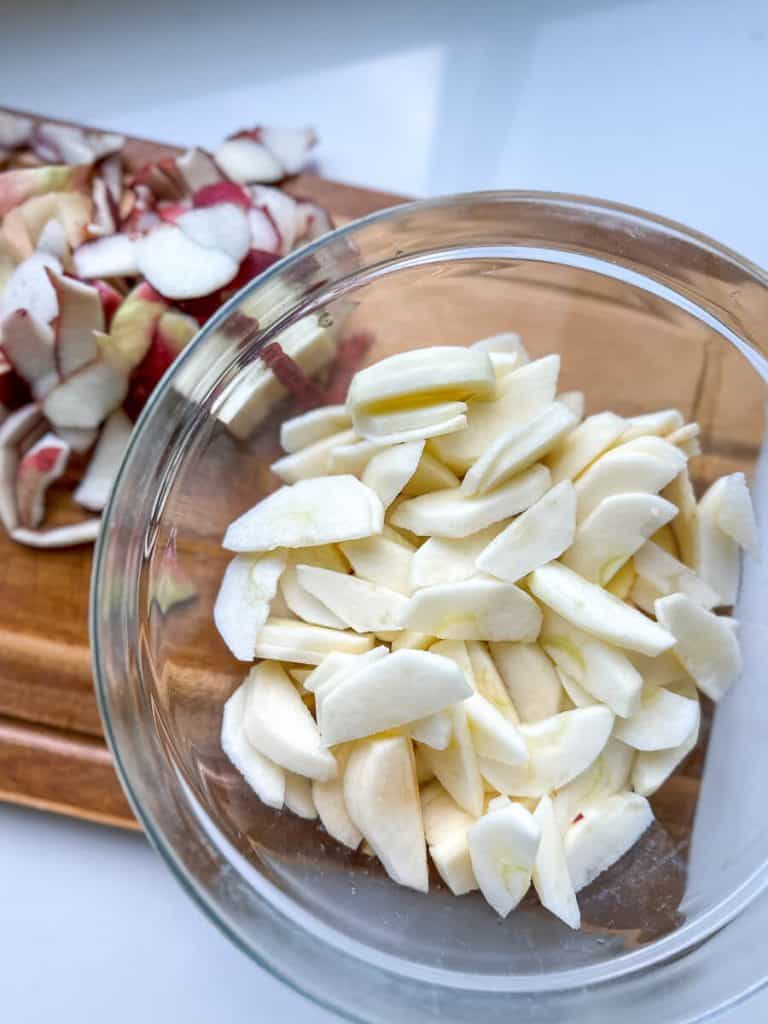 Peeled apples in a bowl.