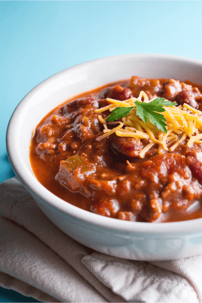 Bowl of chili with cheese.