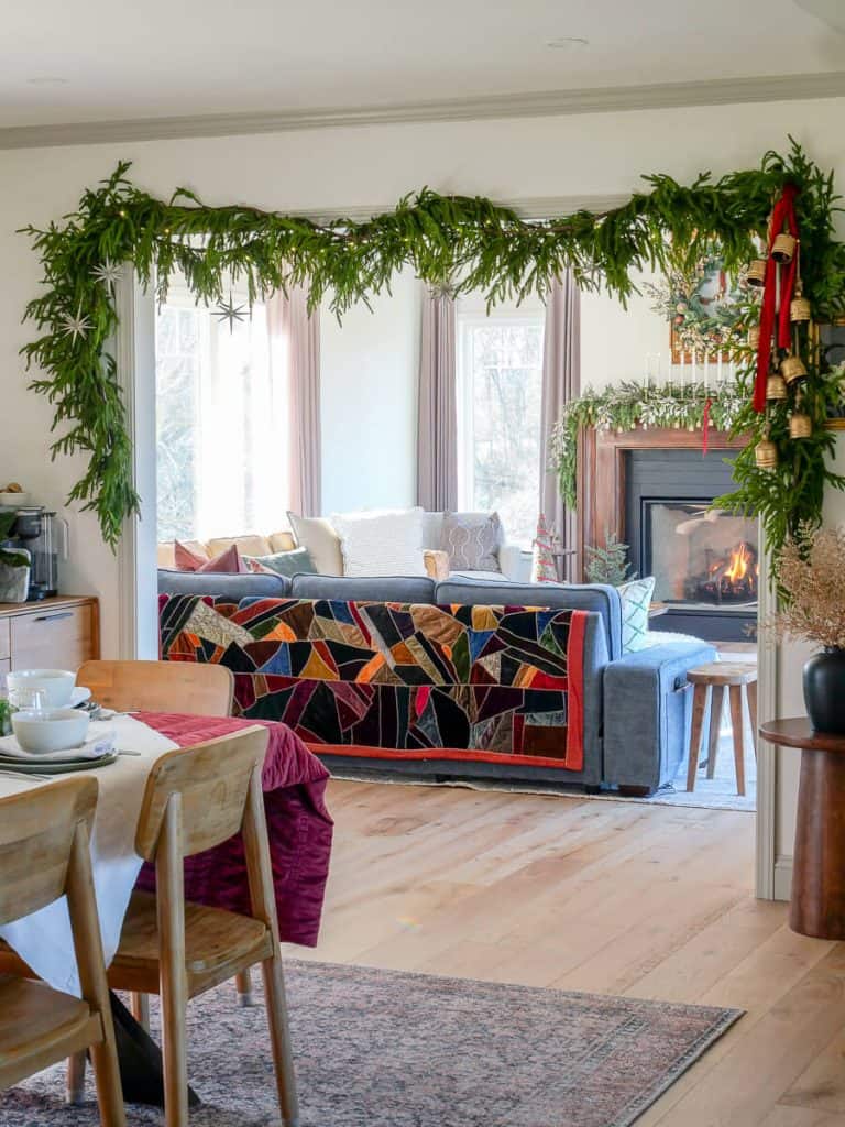 Norfolk pine garland over a room opening.