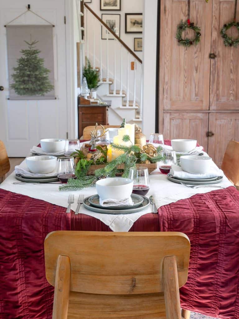 Set of dishes on an elegant Christmas table.