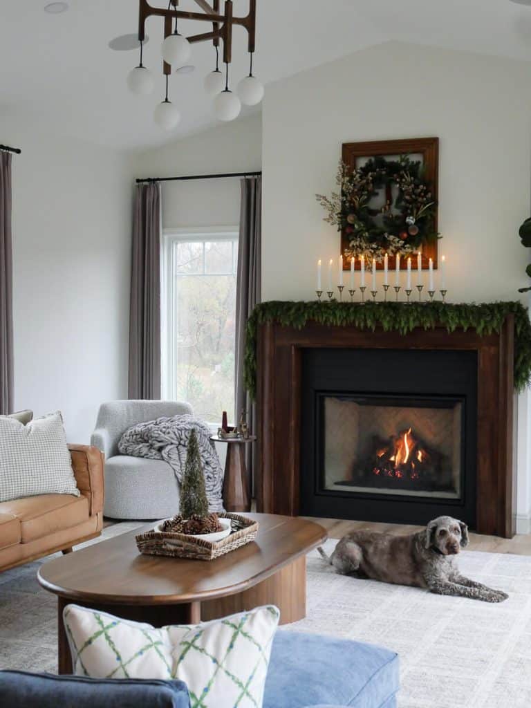 Fireplace mantel with cedar garland.