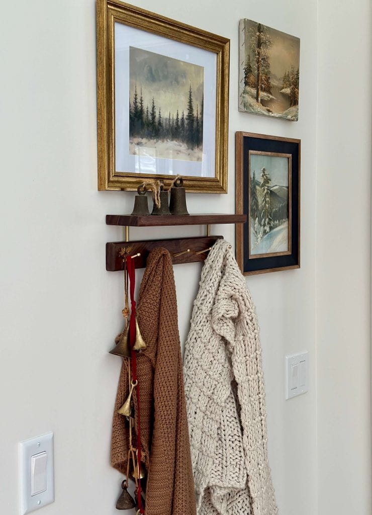 Blankets hung on the wall with bells.