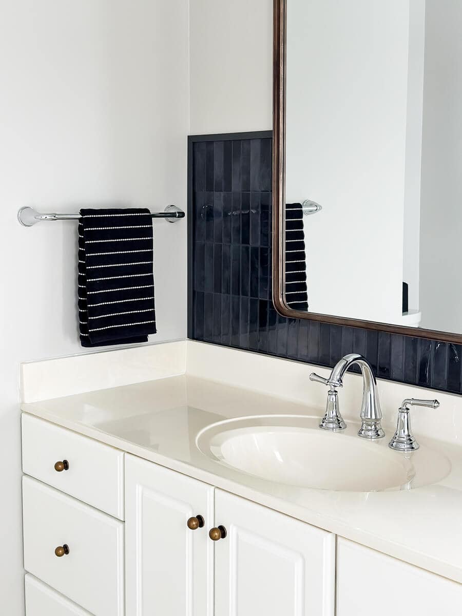 Faux tile backsplash in a bathroom.