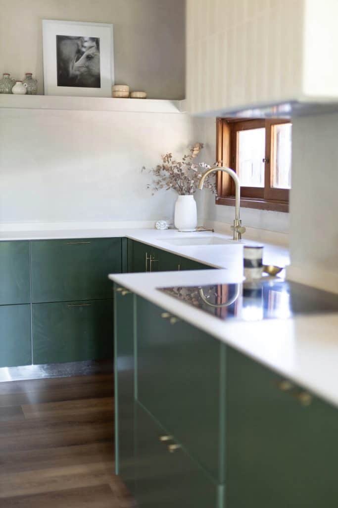 Green lower kitchen cabinets.