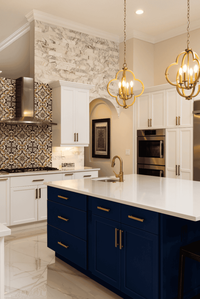 Navy blue island in a white kitchen.