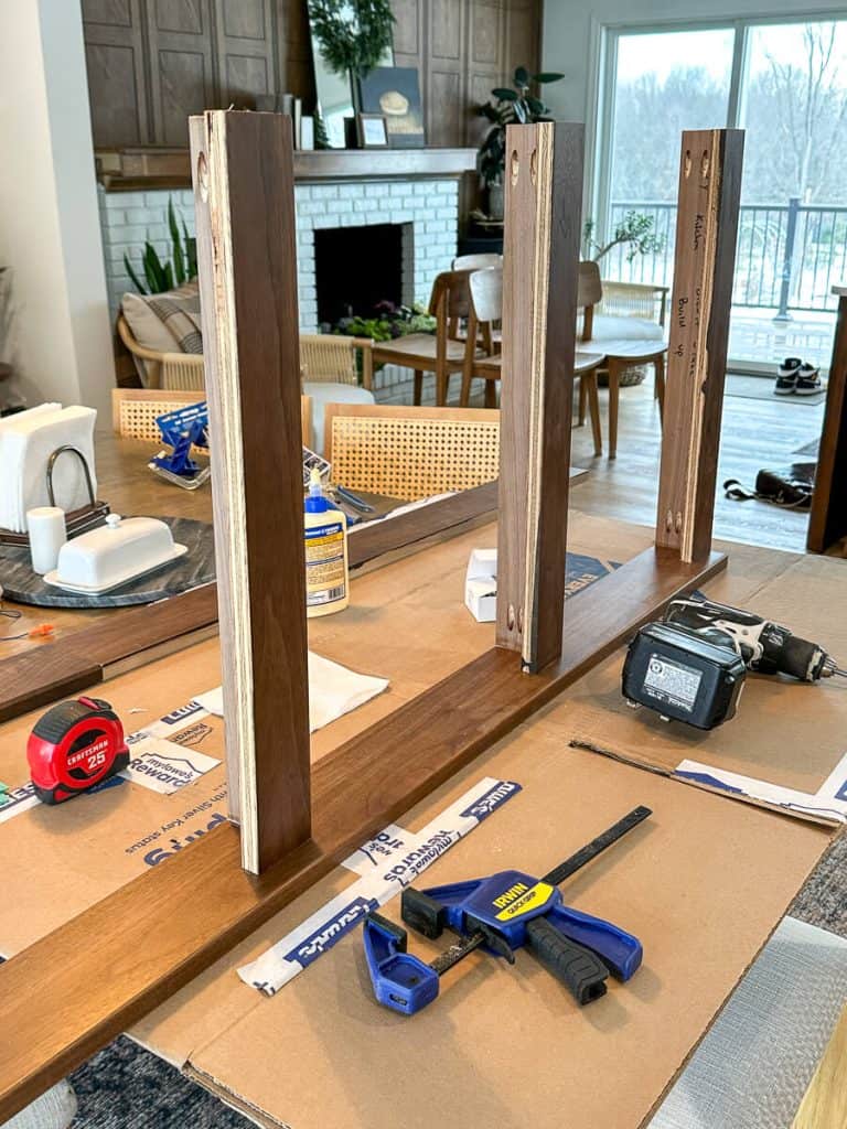 Wood plate rack being assembled.