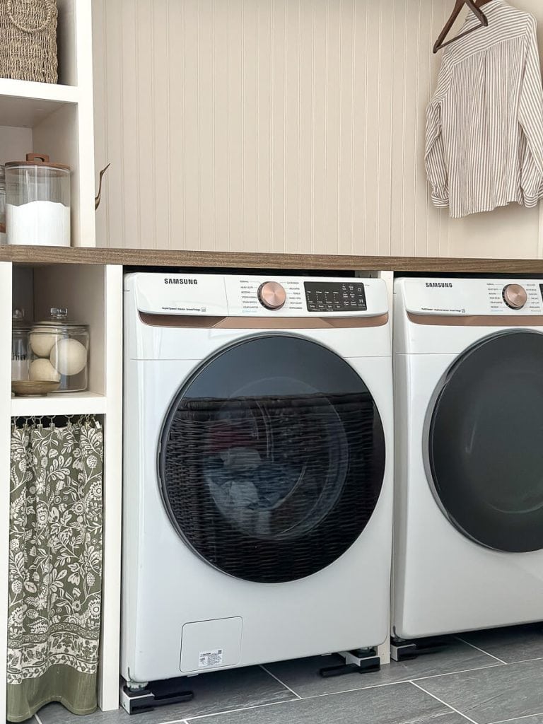 Adding face frame to laundry cabinet.