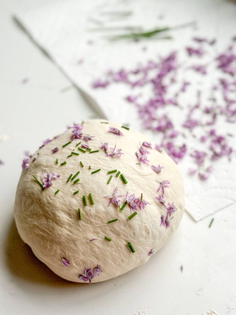 Chive sourdough bread boule ready to bake.