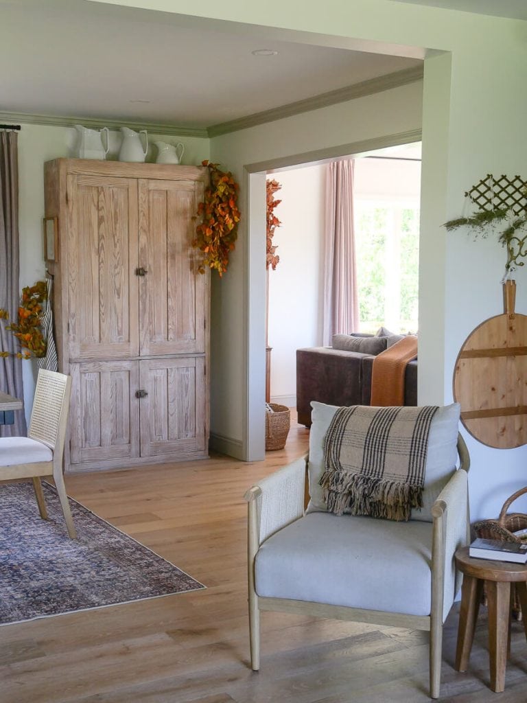 Plaid blanket draped on a chair.