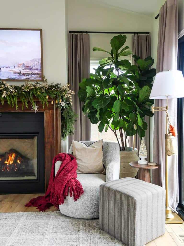 Cozy throw blanket on an accent chair.