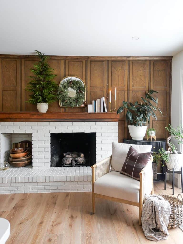 Tall pine tree on a Christmas mantel.