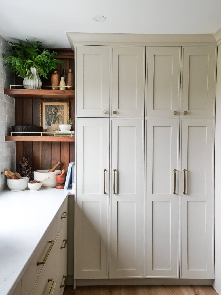Kitchen shelves decorated for a cozy Christmas.