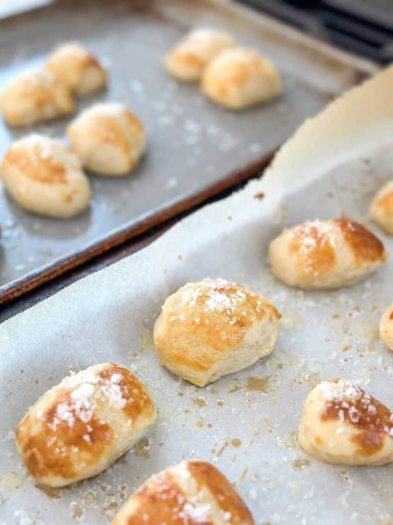 Pretzel bites on a baking sheet.