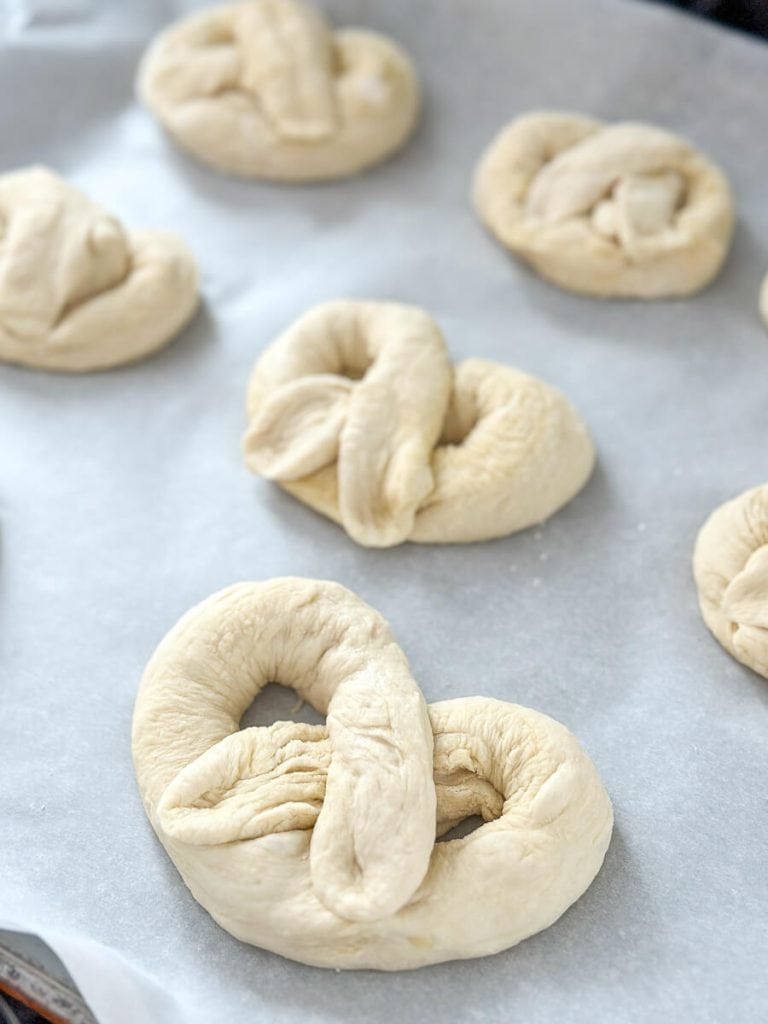 Shaped soft pretzel buns.