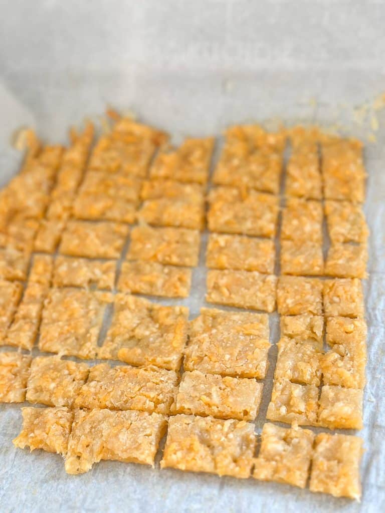 Sourdough discard cheese crackers on a pan.